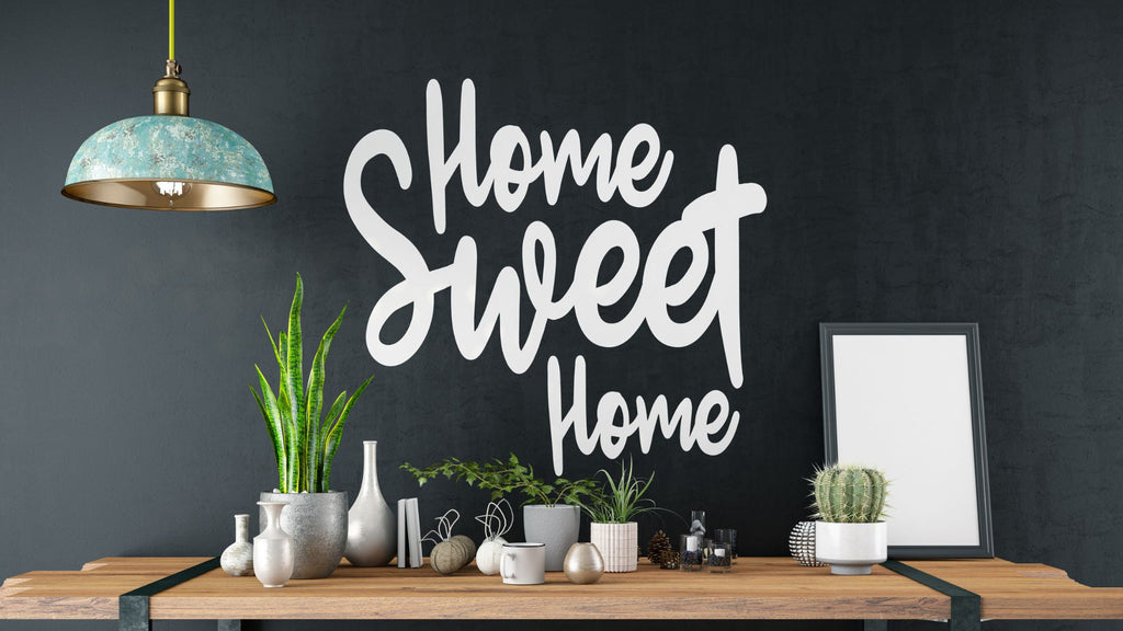 A decorated wall that reads "Home Sweet Home."
