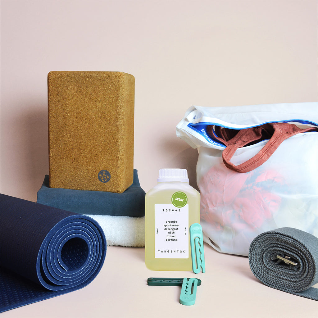 An assortment of hot yoga equipment and eco-friendly laundry products