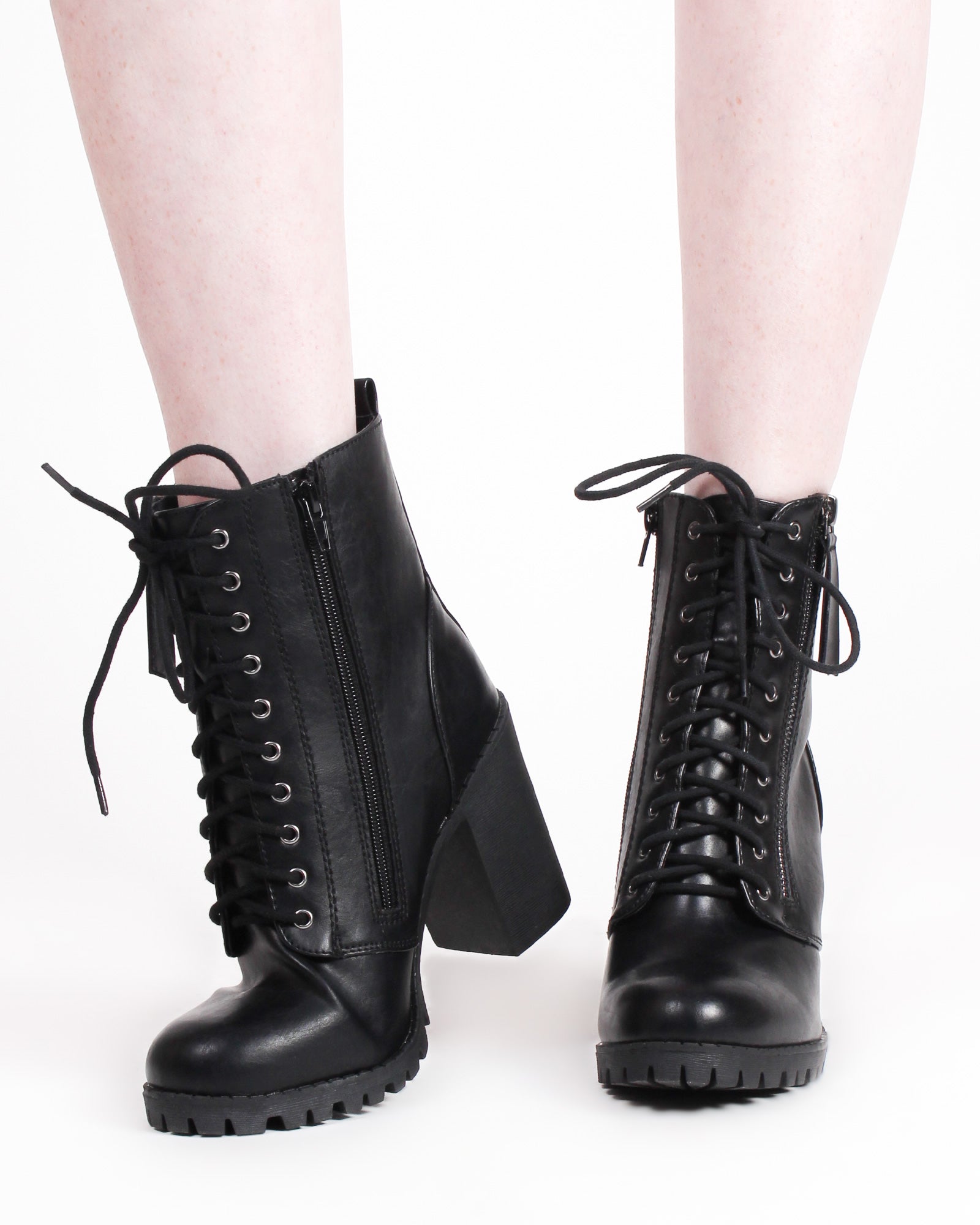 black leather combat boots with heels