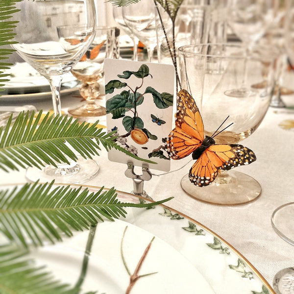 Mr. P's Place Cards on a wedding table with butterflies