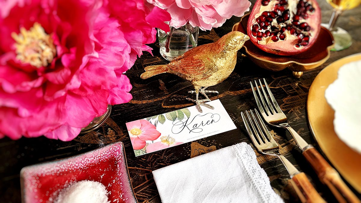 the punctilious MR. p's place card co. "rose garden" laydown place card  on chinoiserie table with beautiful flowers and bamboo cutlery