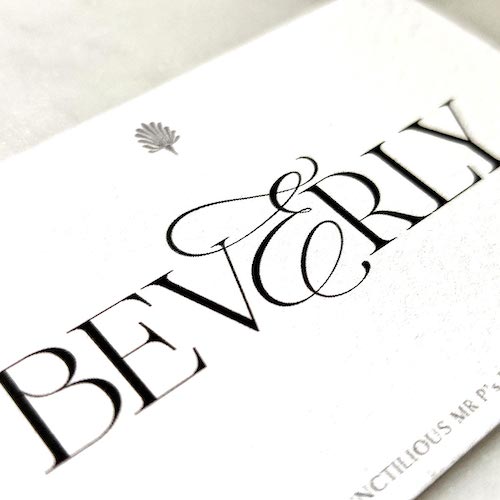 close up detail of The Punctilious Mr. P's Place Card Co. 'Bel Air' Font digitally printed on the back of a place card