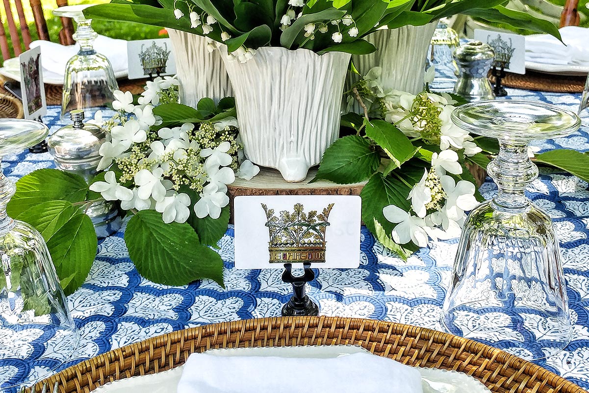 Lunch alfresco with mr. P's coronet nouveau illustrated place cards, block print tablecloth, and fresh flowers 