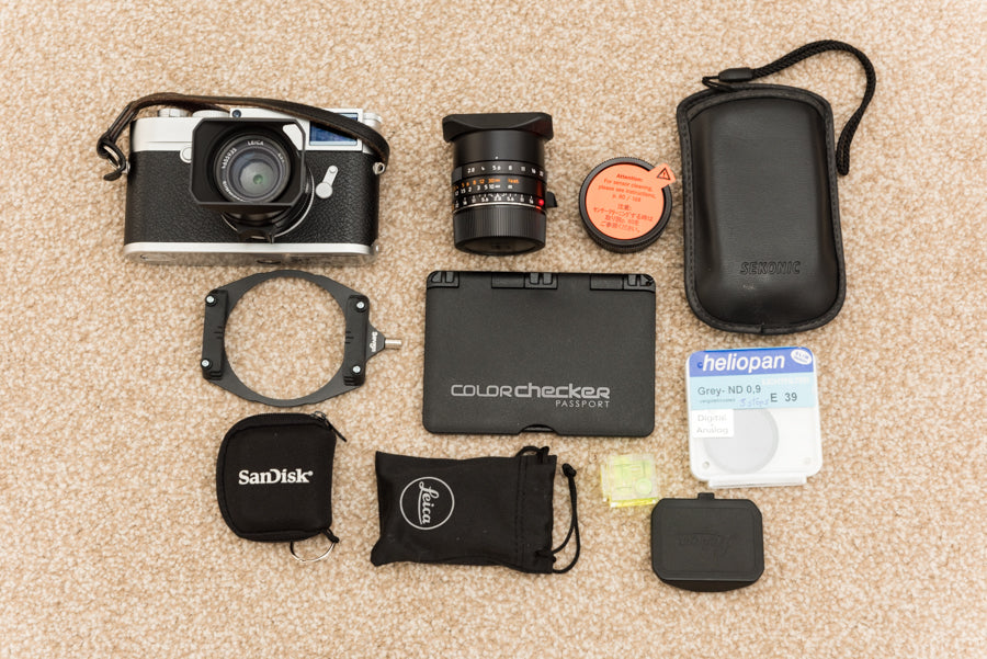 Exterior buildings kit: Leica M10, Elmarit 28mm f2 lens Summicron ASPH 35mm F2 lens, light meter, color checker, Lee filter adapter, ND filer, spirit level cube, spare battery and SD cards - Bag used Hadley Pro