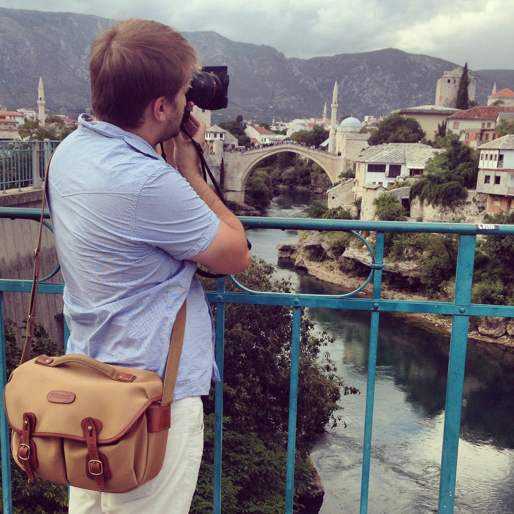 Oggi Tomic looking towards the Stari Most bridge in Mostar, Bosnia