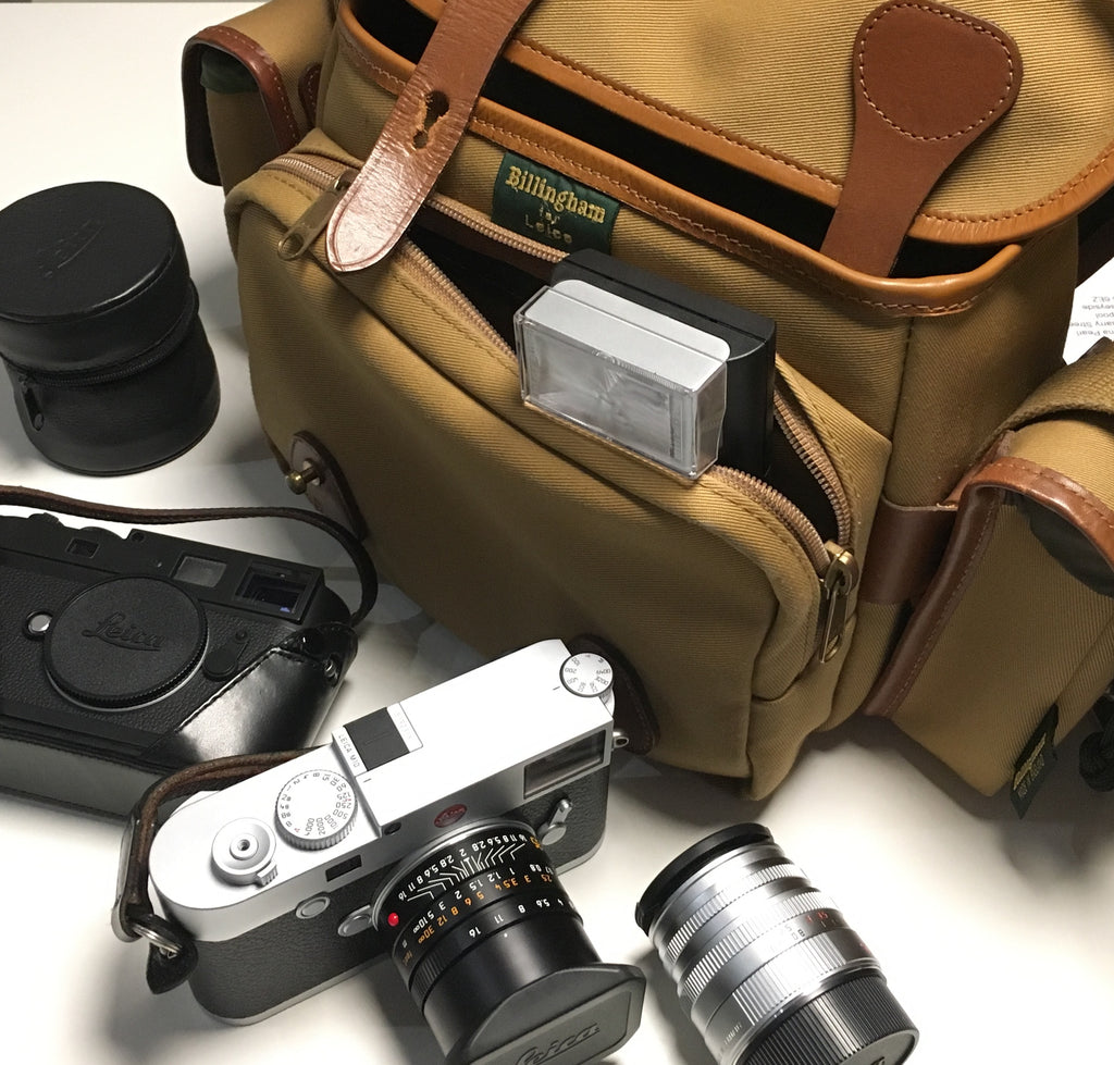 Leica M Combination Bag, with Leica M10, Leica M10 Monochrom, Summicron 35mm , Summicron 50mm along with Leica SF24D flash - Photo by Rena Pearl