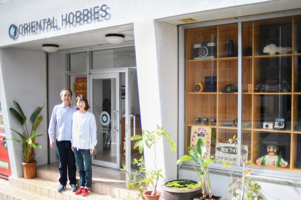 Eddie and his wife in front of Oriental Hobbies in Okinawa.
