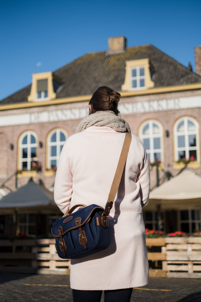 Billingham Hadley Small Pro Camera Bag (Navy Canvas / Chocolate Leather) in the historic city of Heusden