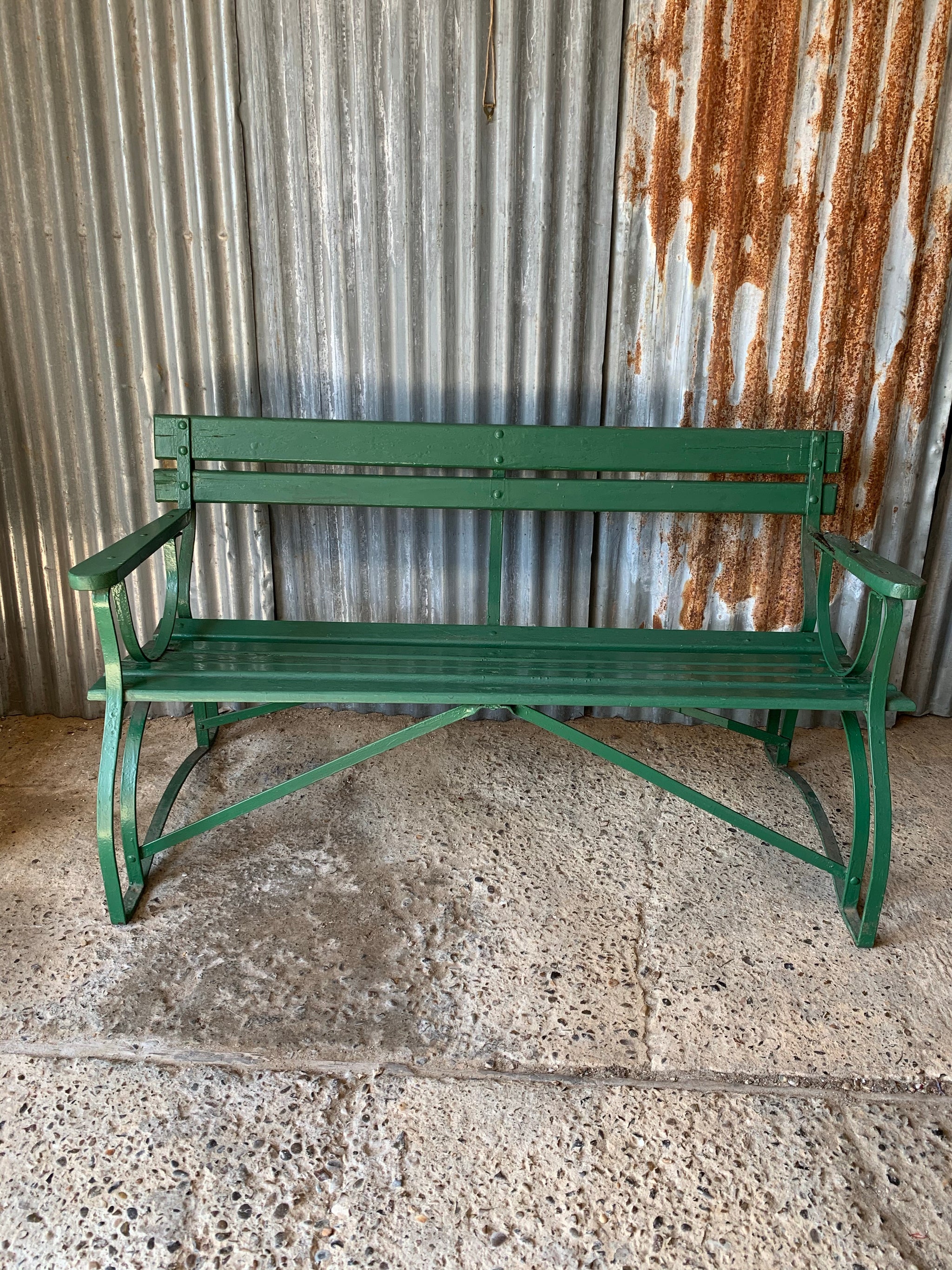 green cast iron garden bench