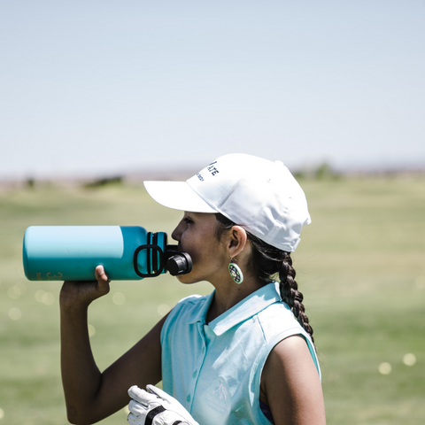 Golf Lady Drinking Water