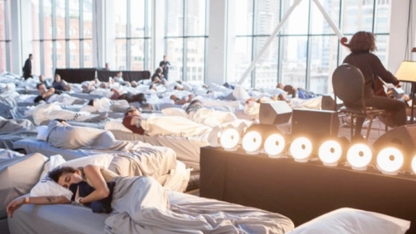 Max Richter performs his 8+ hour long work called Sleep in a loft in Tribeca, New York while attendees sleep on mattresses scattered across the large, light-filled space.