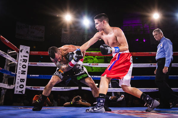 Professional boxer fueled by dairy-free protein hits his opponent with a jab