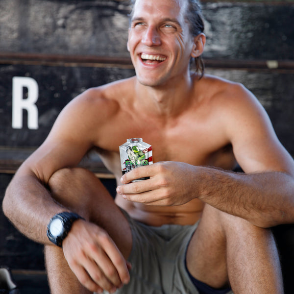 Athlete drinking Frog Fuel collagen protein