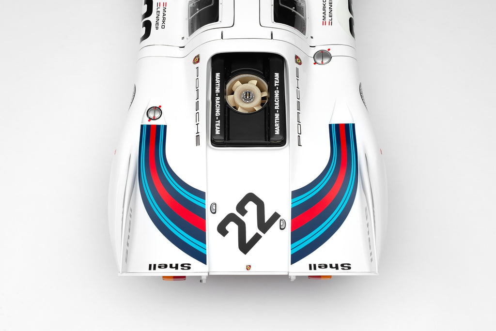 For the ultimate collector, the 1:8 scale is currently available to order. This supremely detailed handcrafted recreation features opening doors and an openable engine cover, fully displaying the spartan race interior and superb 4.9 litre flat-12 atmospheric power unit.  The Team Martini Porsche finished two laps ahead of its rival John Wyer Porsche and an incredible 29 laps (386km) ahead of the third place Ferrari. The two Porsches were the first cars to cover over 5000km at Le Mans, clocking 5335km (3315 miles) at an average 222 km/h (138 mph). This was a phenomenal achievement in 1971, so much so that the record would stand for 39 years, cementing the 917K’s dominance over this era of motorsport. That’s pretty remarkable for a car that, when it was introduced two years prior, was deemed almost undriveable at high speed by even the finest of drivers.