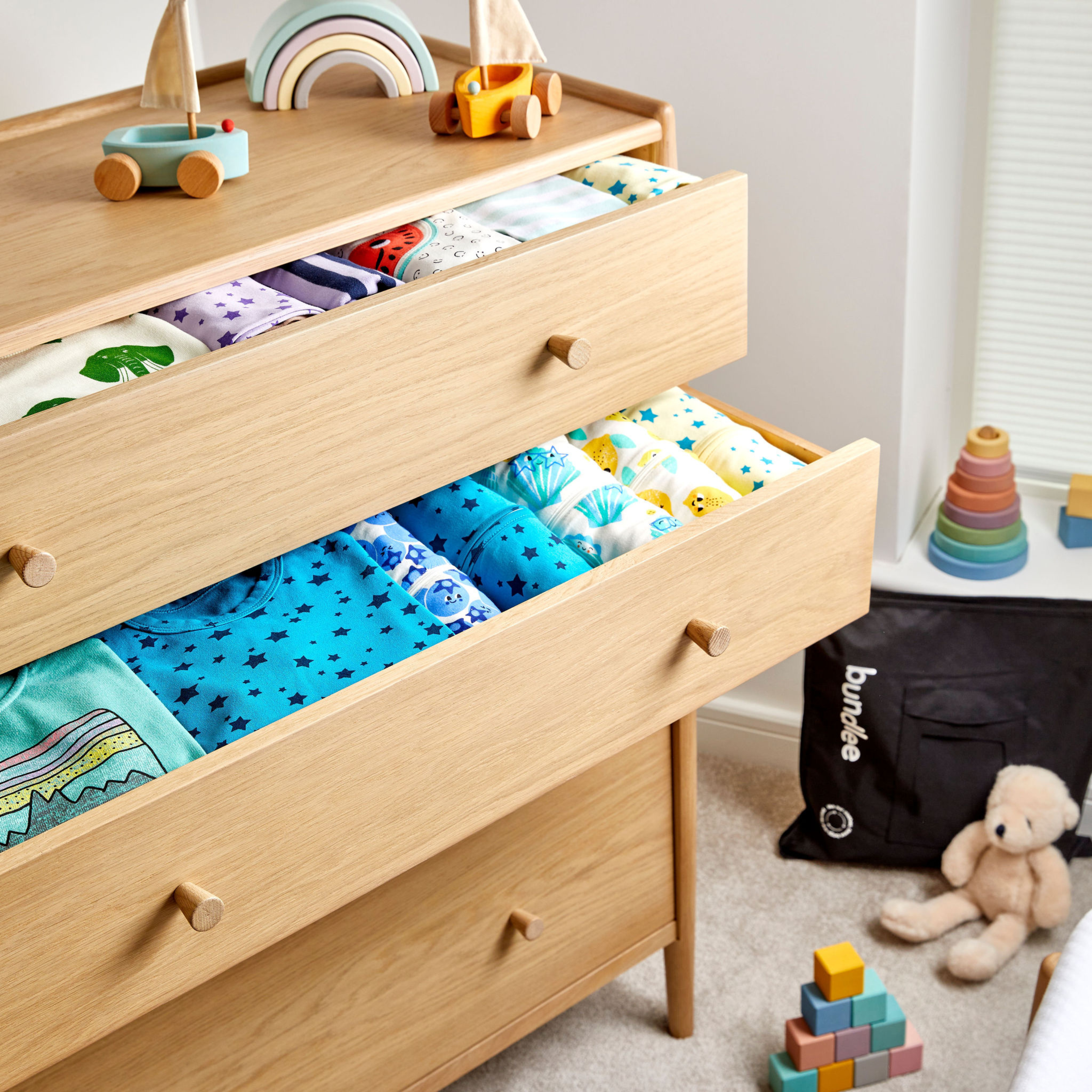 Spring cleaning baby drawers - how to save space in your baby drawers - rent baby clothes