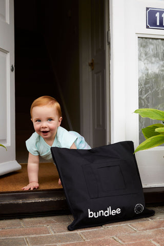 Bundlee clothes delivery at door with baby - rent baby clothes