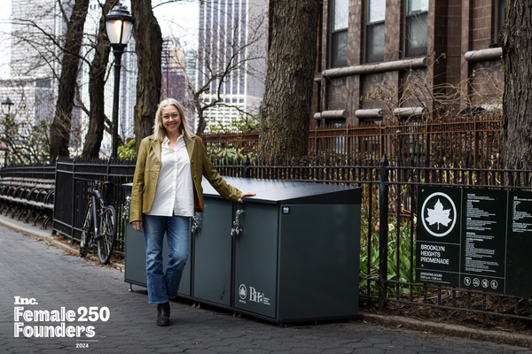 Liz Picarazzi with a CITIBIN trash enclosure in Brooklyn Heights Promenade