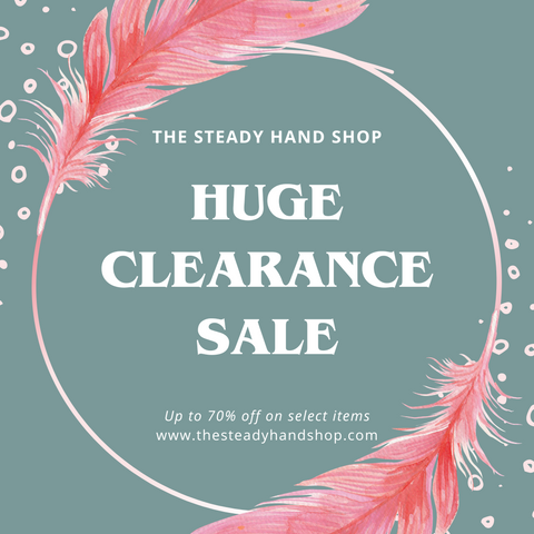 Huge clearance sale at thesteadyhandshop.com graphic with white text, pink feathers and green background.