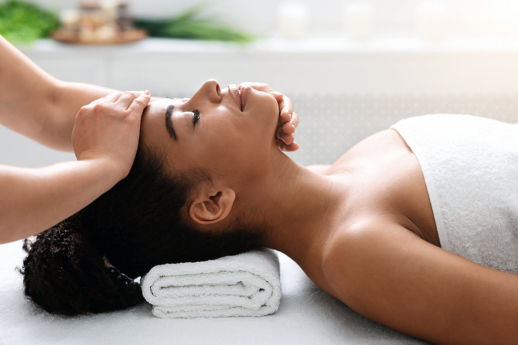 woman getting acupressure treatment for spring seasonal allergy relief