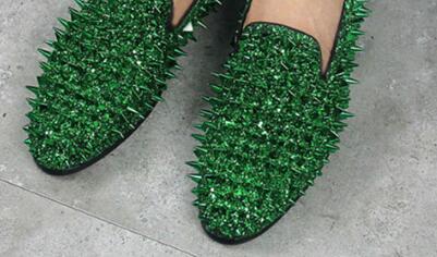 green spiked loafers