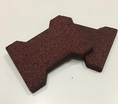 A sample of the split Regupol interlocking rubber pavers in red.