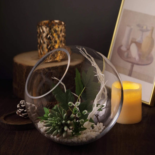 Florist and a kit of terrarium supplies in clear glass vases Stock Photo by  Iakobchuk