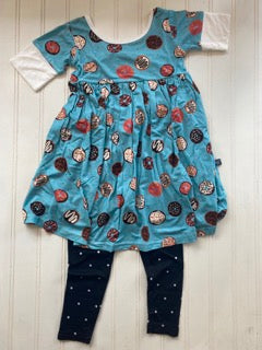 A donut dress paired with polka dot leggings
