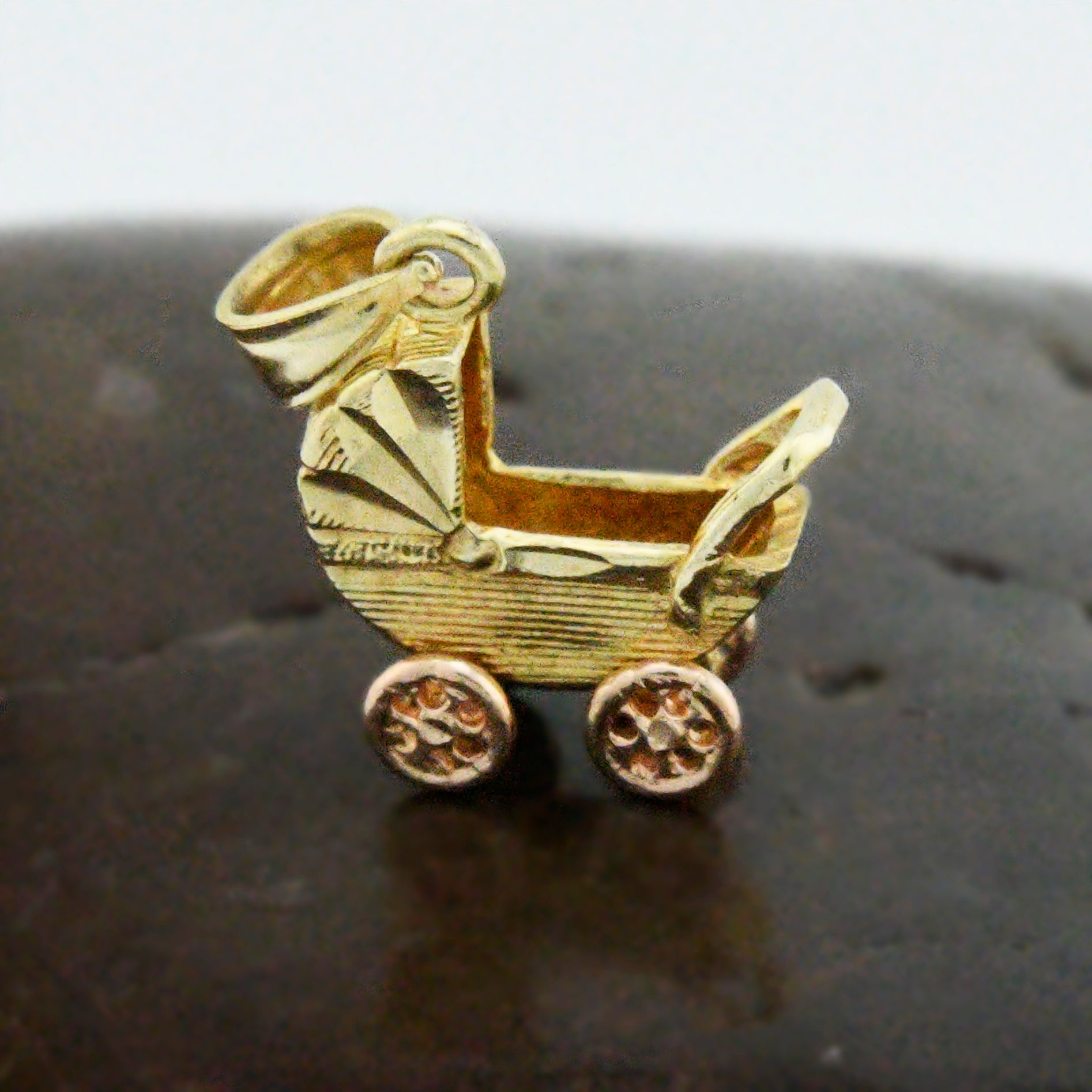 gold baby carriage