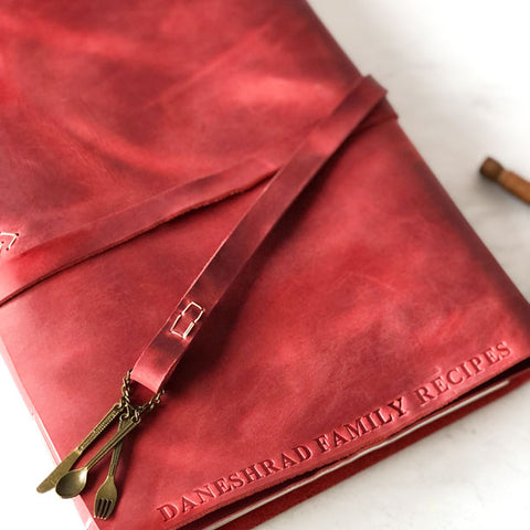 red leather recipe book embossed with family name