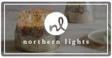 Northern Lights Candles logo and candle background