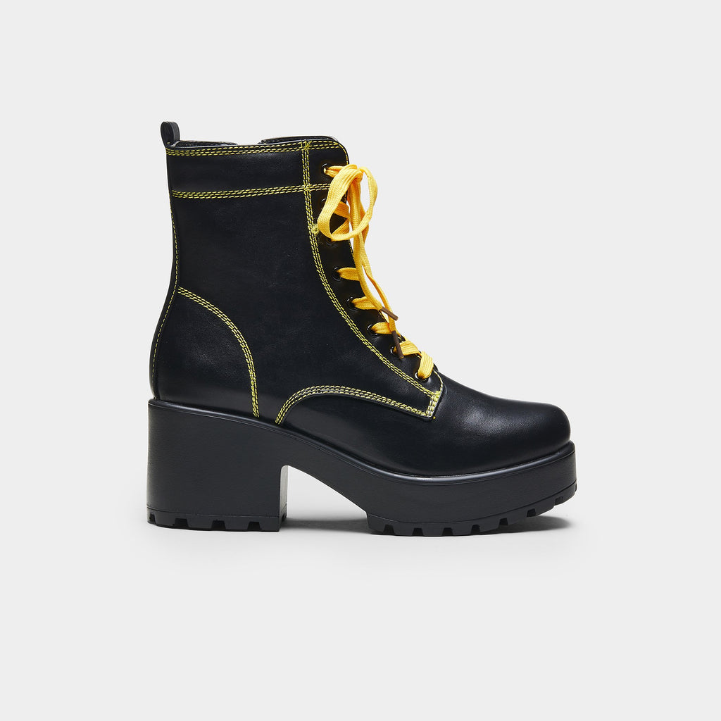 black boots yellow laces