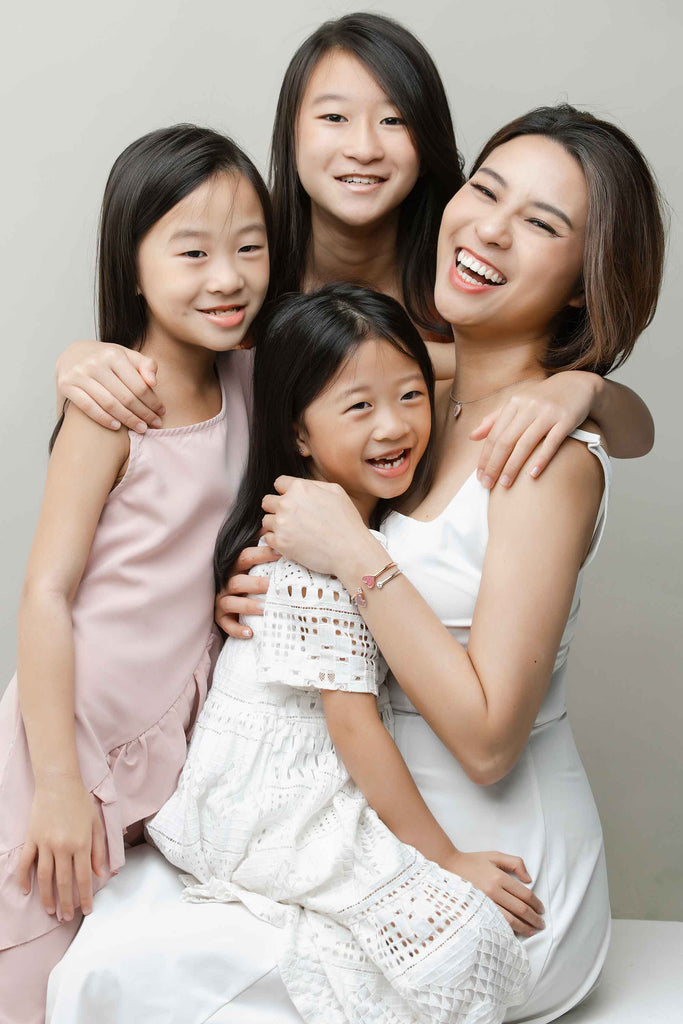 Joanna Goy and her 3 daughters