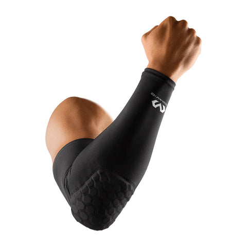 OrthOut McDavid Hex Shooter Arm in black, shown on isolated black man's arm on white background. 