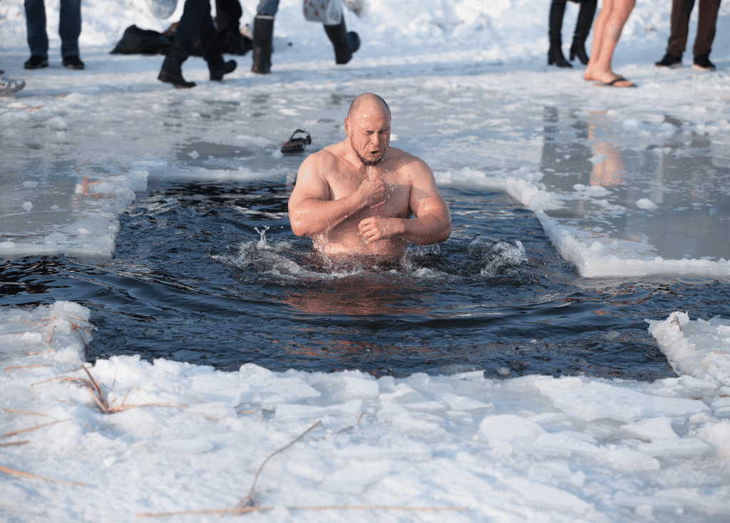 Man taking a cold plunge