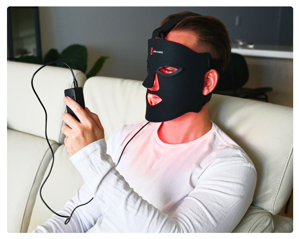 Man wearing a Red Light Face Mask