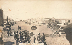 Cupar, Saskatchewan RPPC Postcard Main Street Scene With Band Members And Automobiles Canada