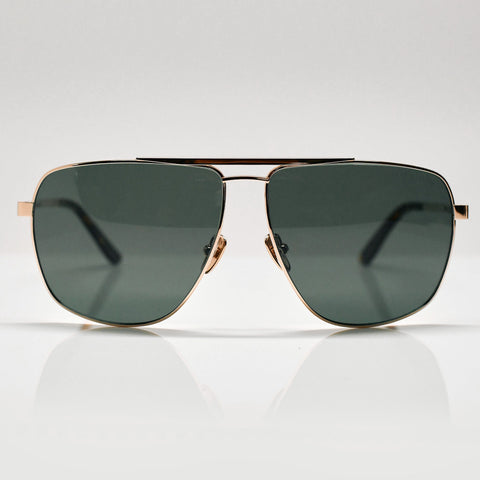 designer sunglasses with green lenses and titanium 18K gold frames
