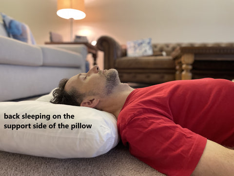 back sleeping on the support side of the traction pillow
