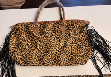 Fringe leopard weekender bag