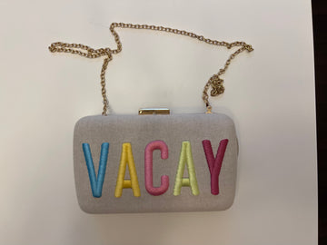 Vacay clutch with optional chain