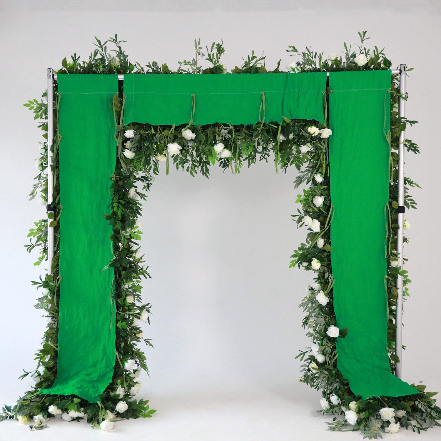 Green and white fabric artificial flower wall is easy to install.