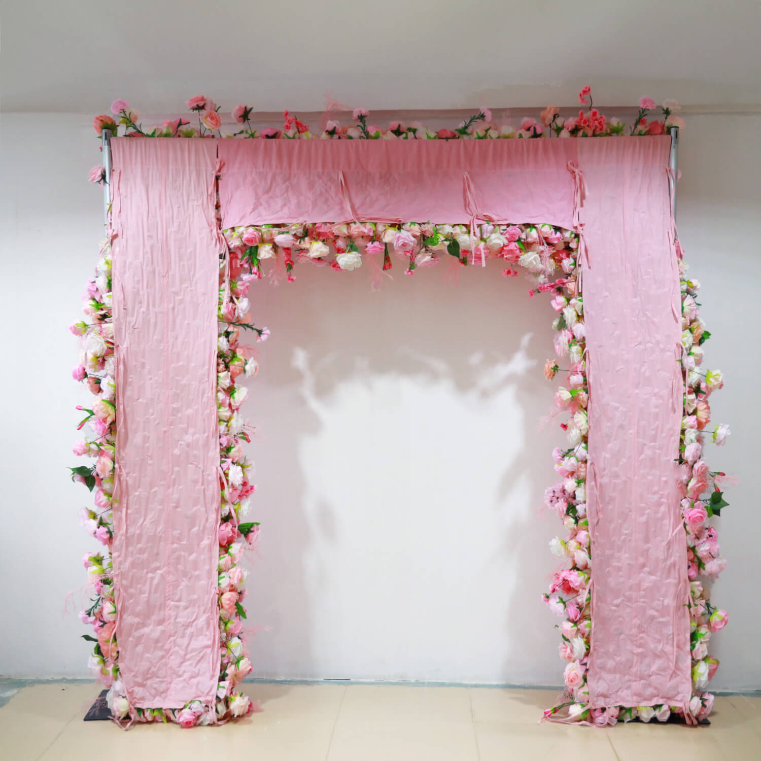 Pink fabric artificial flower wall arch looks romantic and  bright.