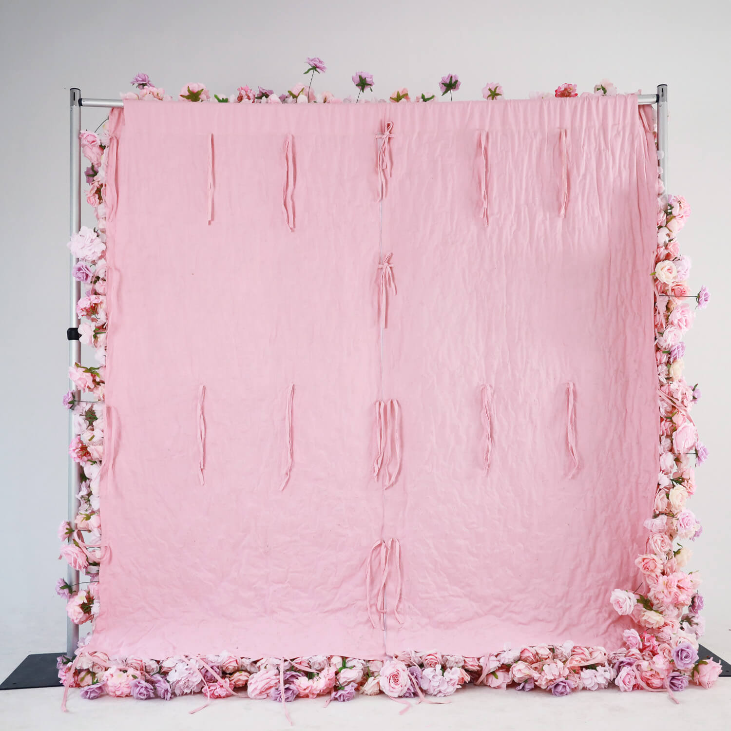 Pink and purple roses fabric flower wall is easy to install.