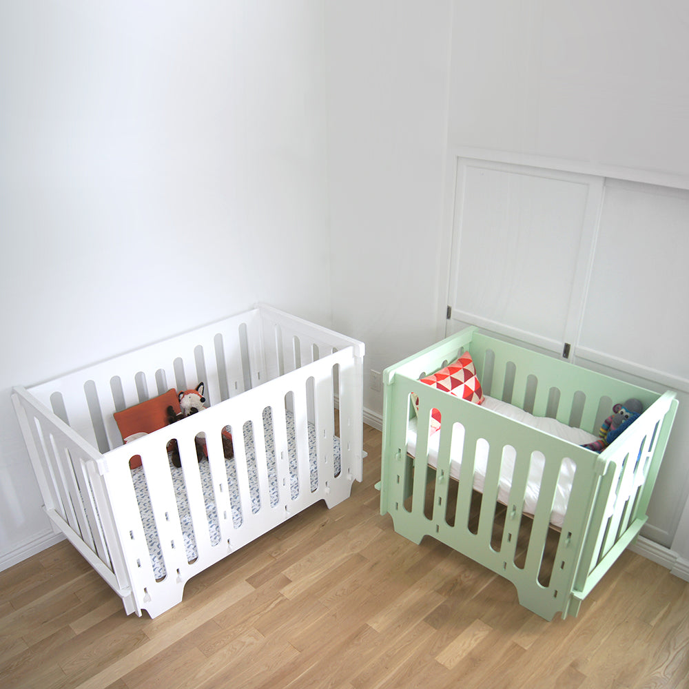 mini crib vs regular crib size