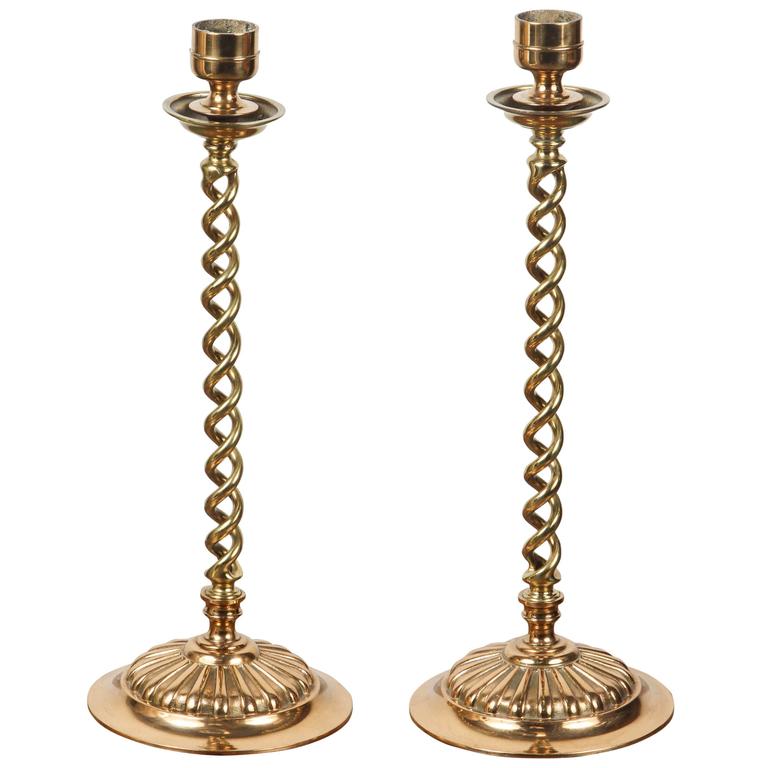Pair of English brass side push-up candlesticks, ht. 9 in United States