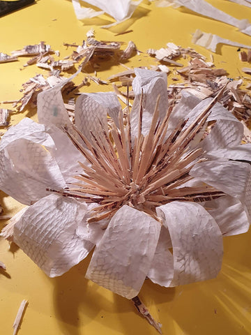 plywood and papier mache flower