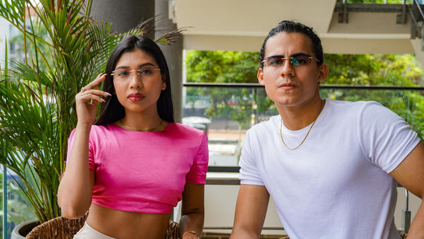 Two models with gold and silver eyewear