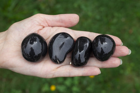 large onyx stones. This stone was thought to be a powerful protector and sharpen the senses and physical responses. Perfect for the Root Chakra, our want for safety and source of physical energy. 