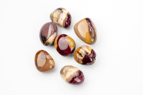 Multi Colored Mookaite Tumbled STones. The golden shade of Mookaite particularly resonates with the solar plexus.