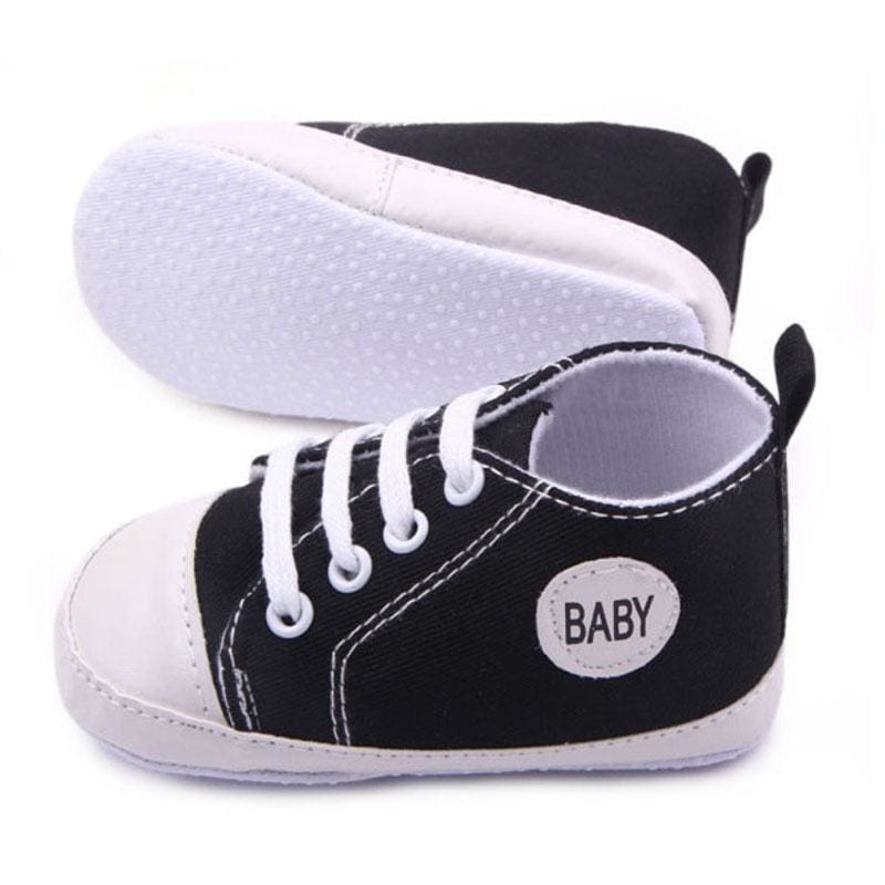 infant white canvas shoes